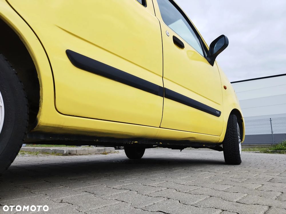 Suzuki Wagon R+ 1.3 GL 4WD - 10