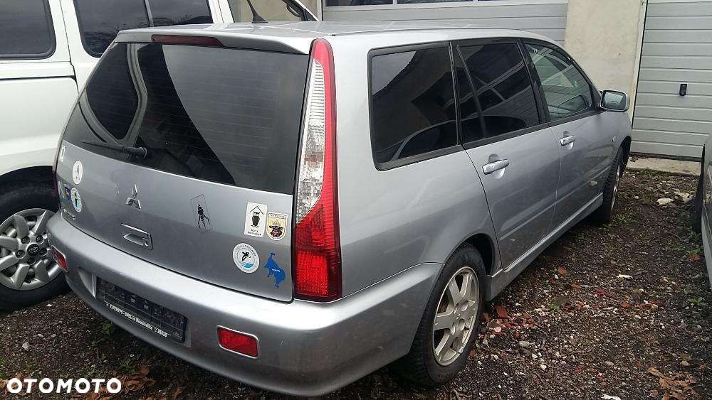 Na części Mitsubishi Lancer VII Silnik Skrzynia Maska Zderzak Drzwi Klapa Szyba - 1