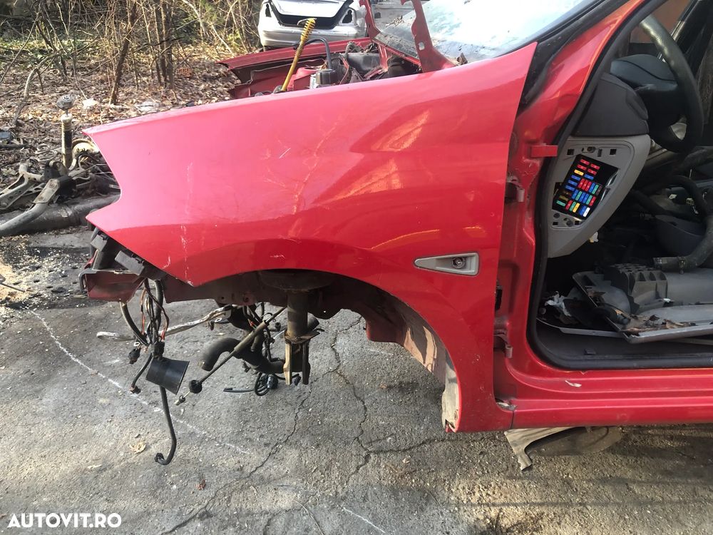 Aripa stanga fata Renault Clio Thalia 2011 rosu - 2