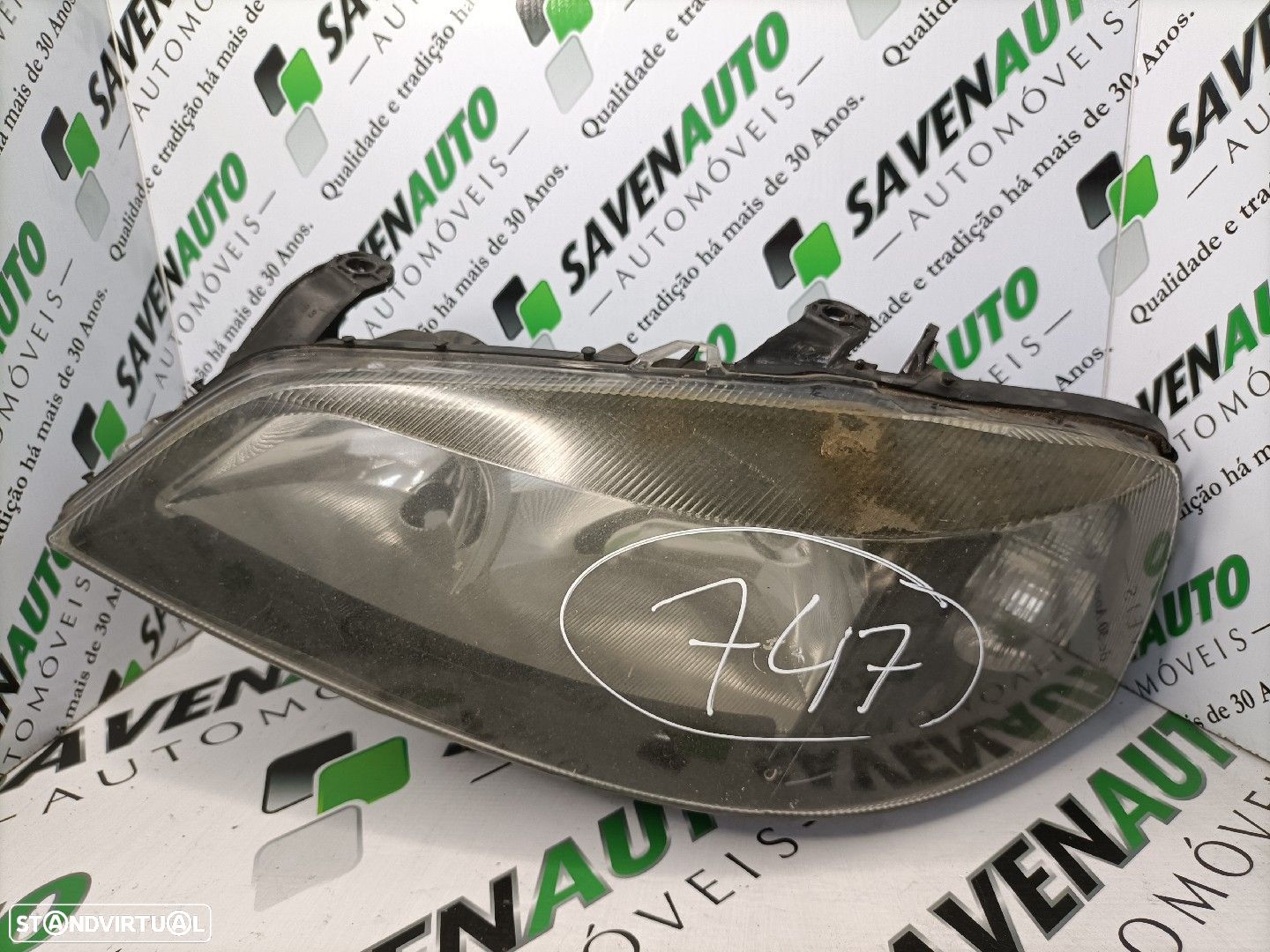 Farol Esq Opel Astra G Caixa (F70) - 1
