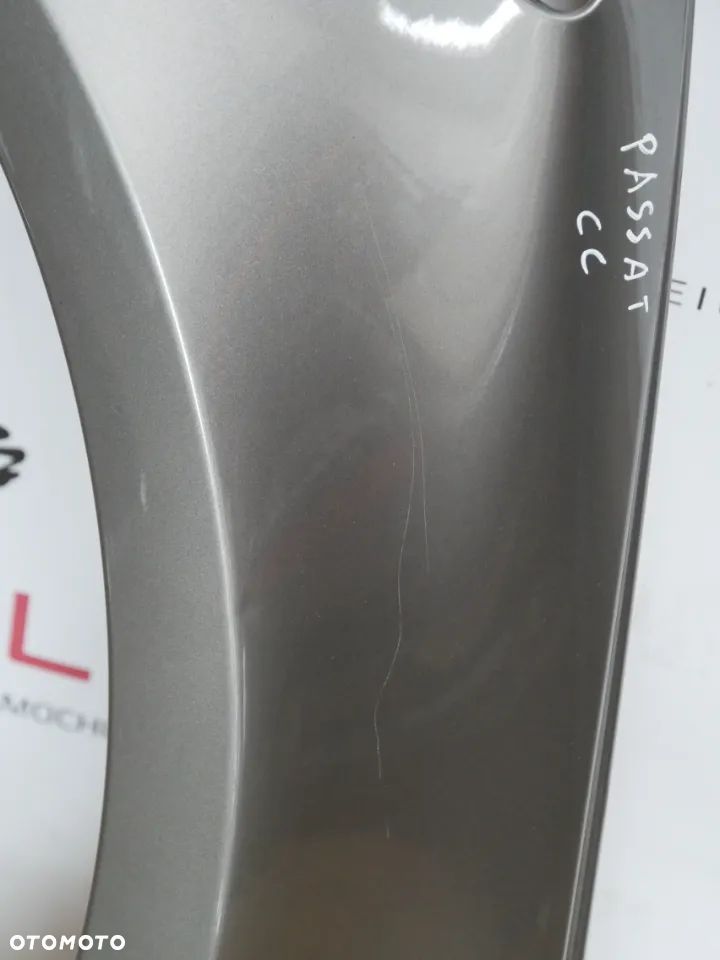 BŁOTNIK PRZEDNI LEWY VW PASSAT CC - 2