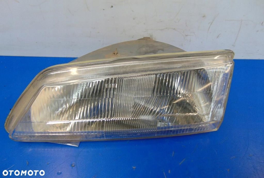 PEUGEOT 106 REFLEKTOR LEWY. - 1