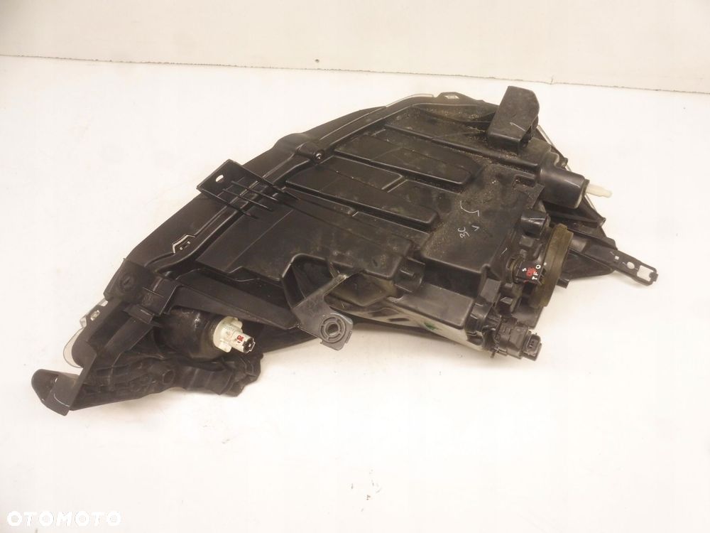 lampa lewa przód nissan nv200 oe 26060bj10a - 4