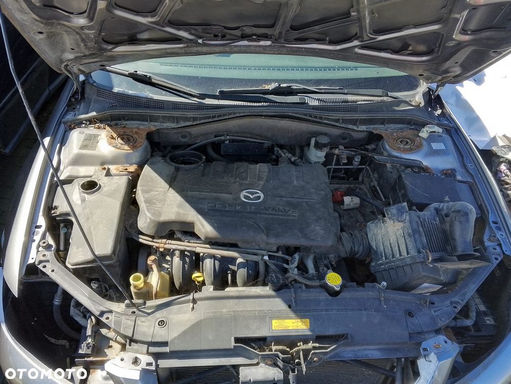 Mazda 6 GG/GY (02-05r.) 1.8B 119KM. Silnik L813 Skrzynia. Cały na części GWARANCJA !!!!  Przód Tył Zestaw Komplet Drzwi Klapa Zderzak Błotnik Maska Grill Atrapa Szyba Pas Lampa Lusterko Boczki Fotel Kanapa Kokpit Deska Rozdzielcza Przełącznik Włącznik Sterownik Przewody Wiązka Instalacja Moduł Komputer Czujnik Listwa Pompa Alternator Wtryski Głowica Rozrusznik Kompresor Sprzęgło Dwumas Silnik Skrzynia ABS Klimatyzacji Paliwa Wspomagania Kolektor Turbina Przepustnica Zawór Chłodnica Koło Hak Belka Sanki Zawieszenie Mcpherson Półoś Amortyzator Wydech Tłumik Zacisk Most - 7