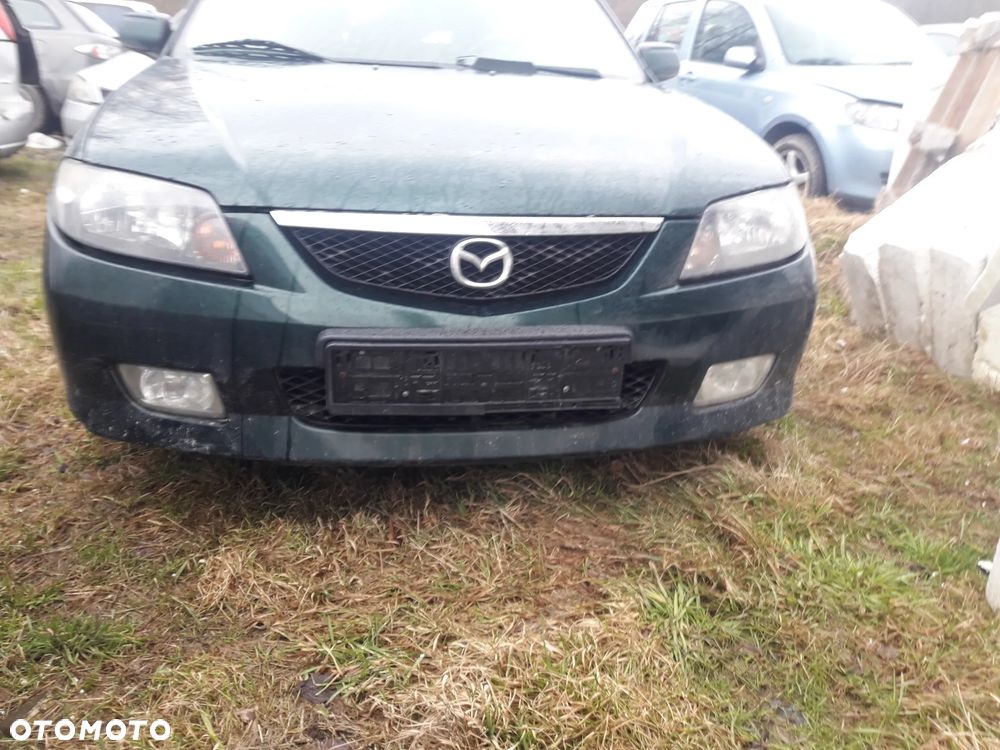 Mazda 323 323f 323  BJ 98-03  Maska lampa zderzak atrapa w kolor 18J - 13