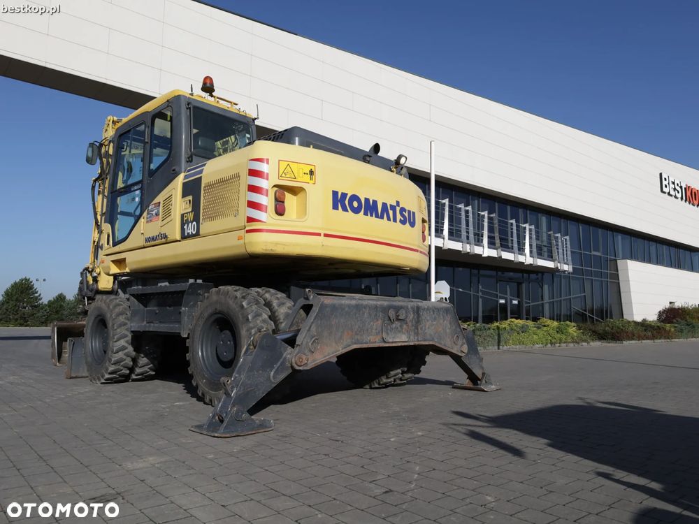 Komatsu PW140-7 - 9