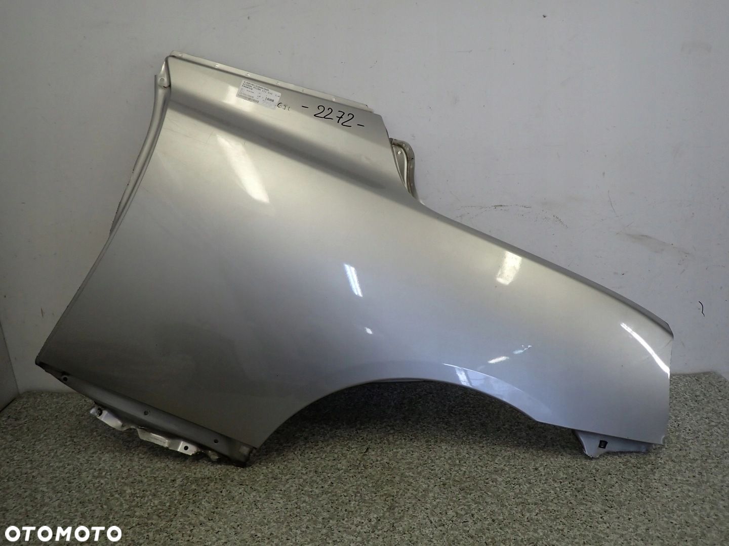 NISSAN MICRA K12 CC 03- BŁOTNIK TYLNY LEWY - 1