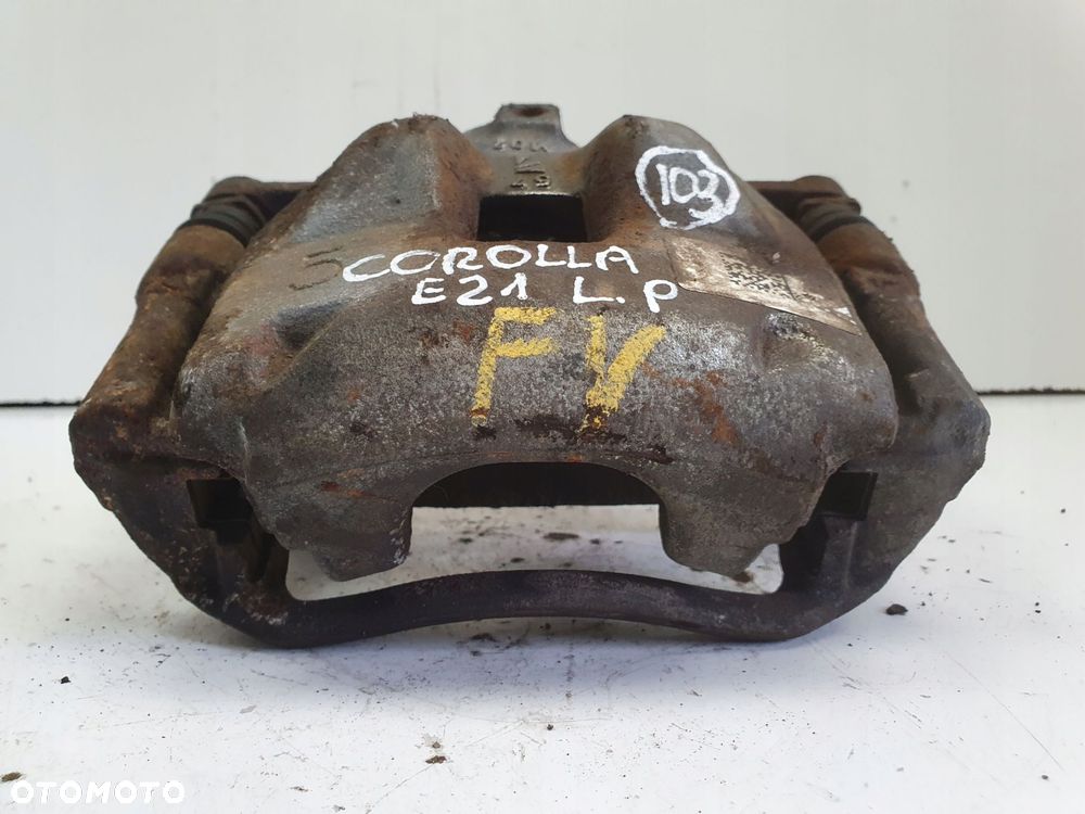 Toyota Corolla XII E21 PRAWY PRZEDNI ZACISK HAMULCOWY przód PASAŻERA - 2