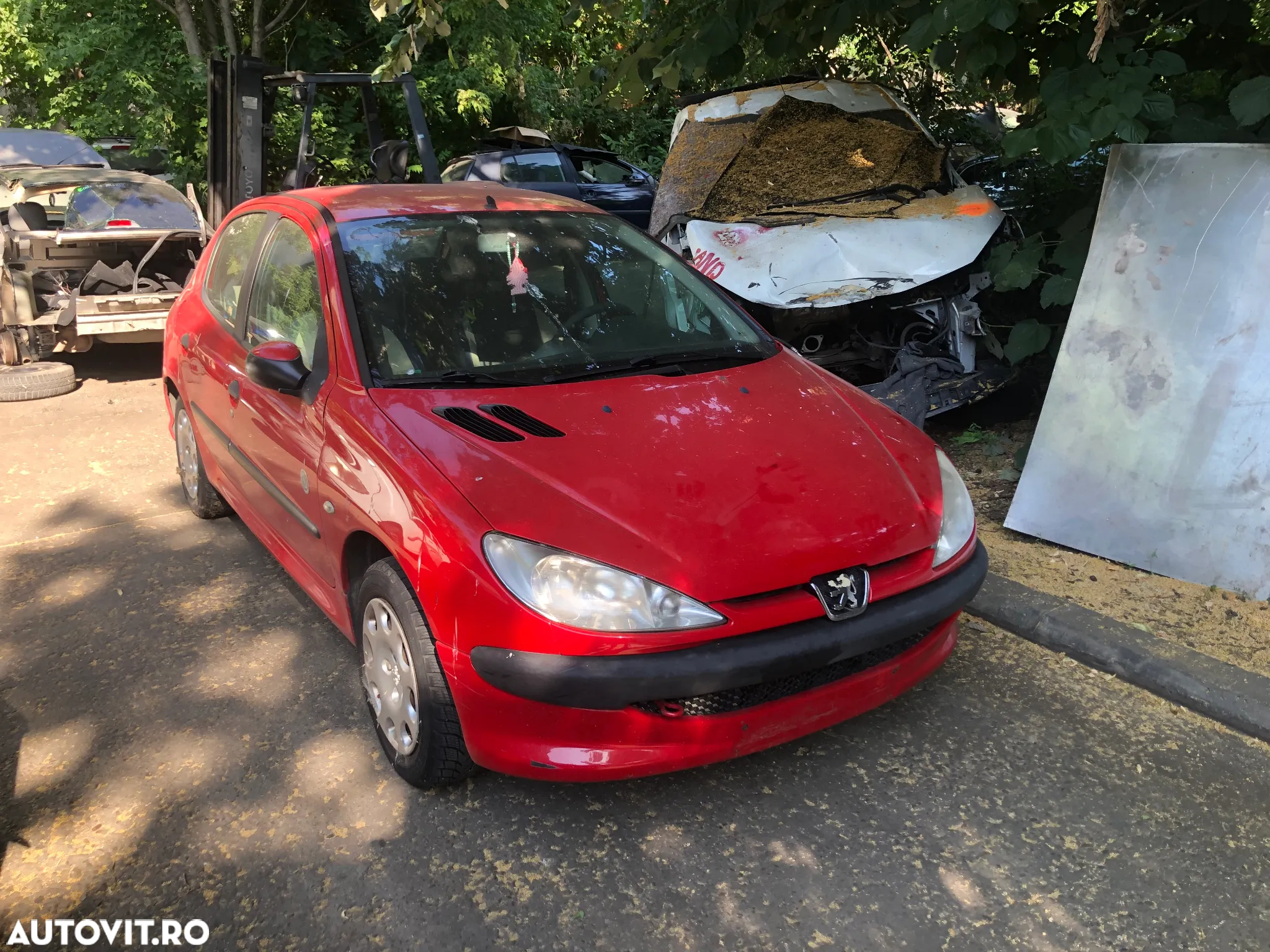 Dezmembrez Peugeot 206 rosu benzina 2005 - 2
