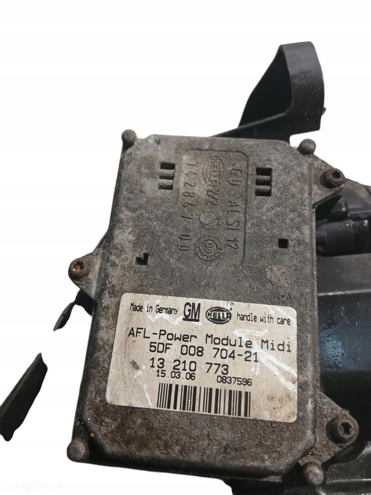 lampa lewa przednia przód xenon opel astra iii h 13210773 5df008704-21 - 4