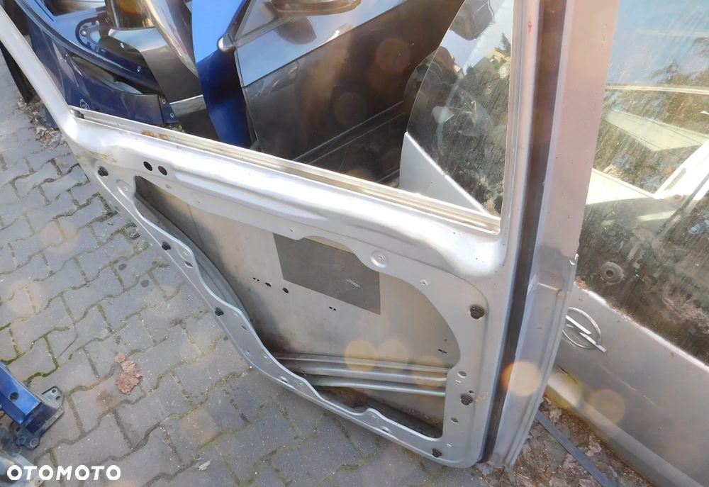 drzwi lewe tył VW TOURAN I SREBRNE LA7W - 11