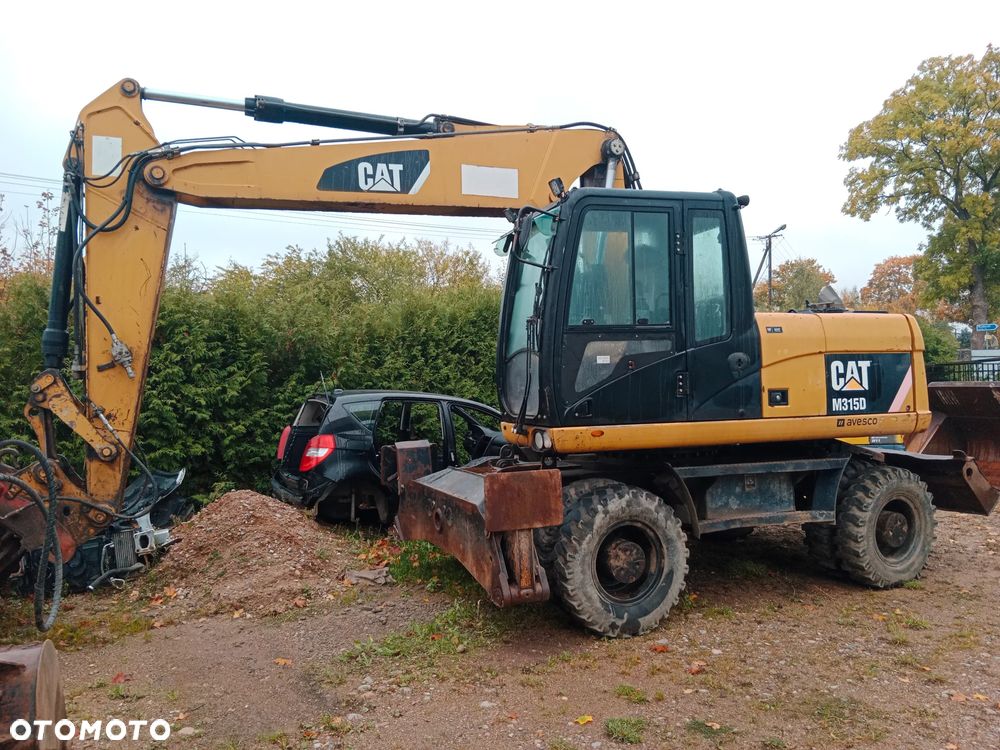 Caterpillar M315D - 3