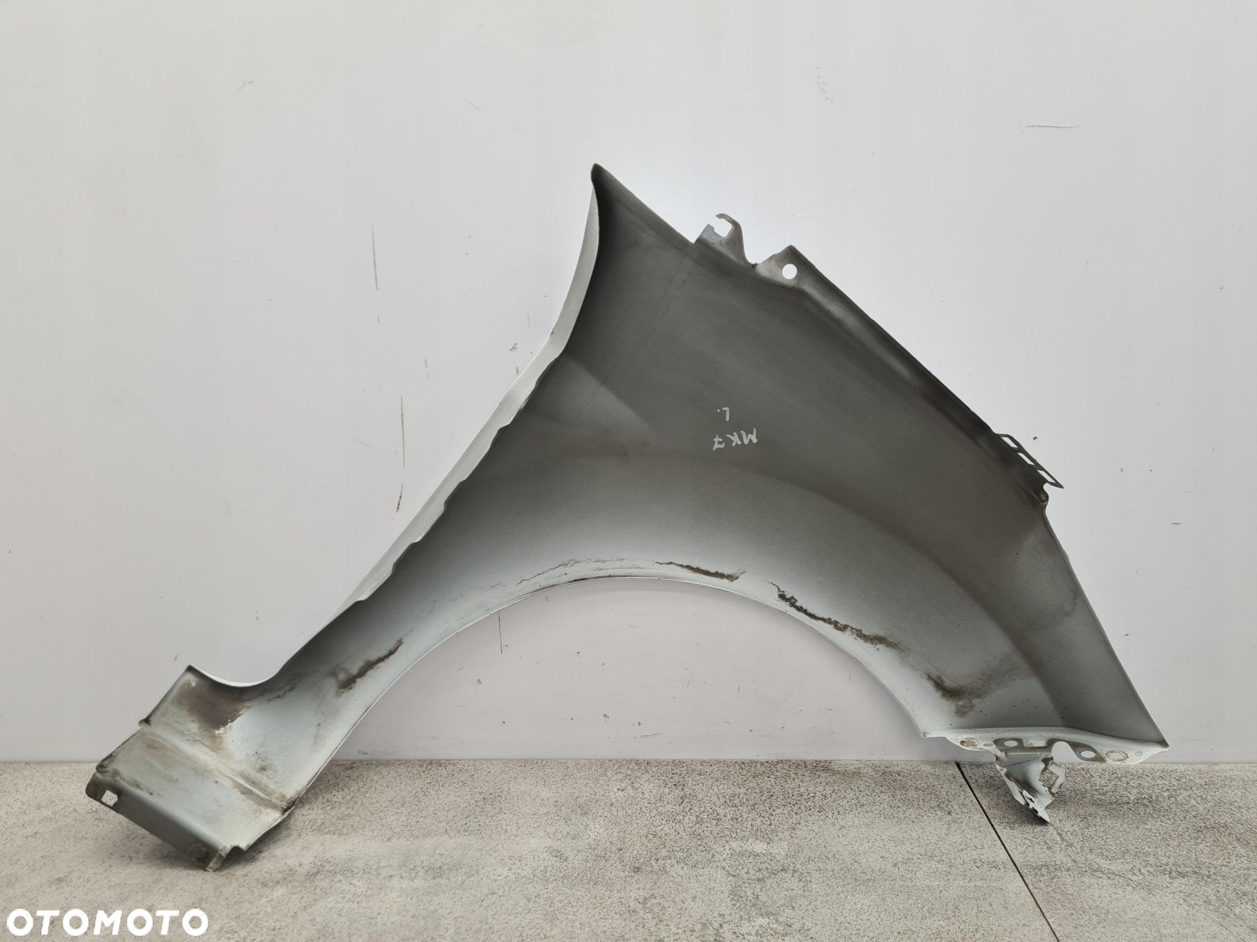FORD FIESTA MK7 BŁOTNIK LEWY PRZÓD H9 - 14