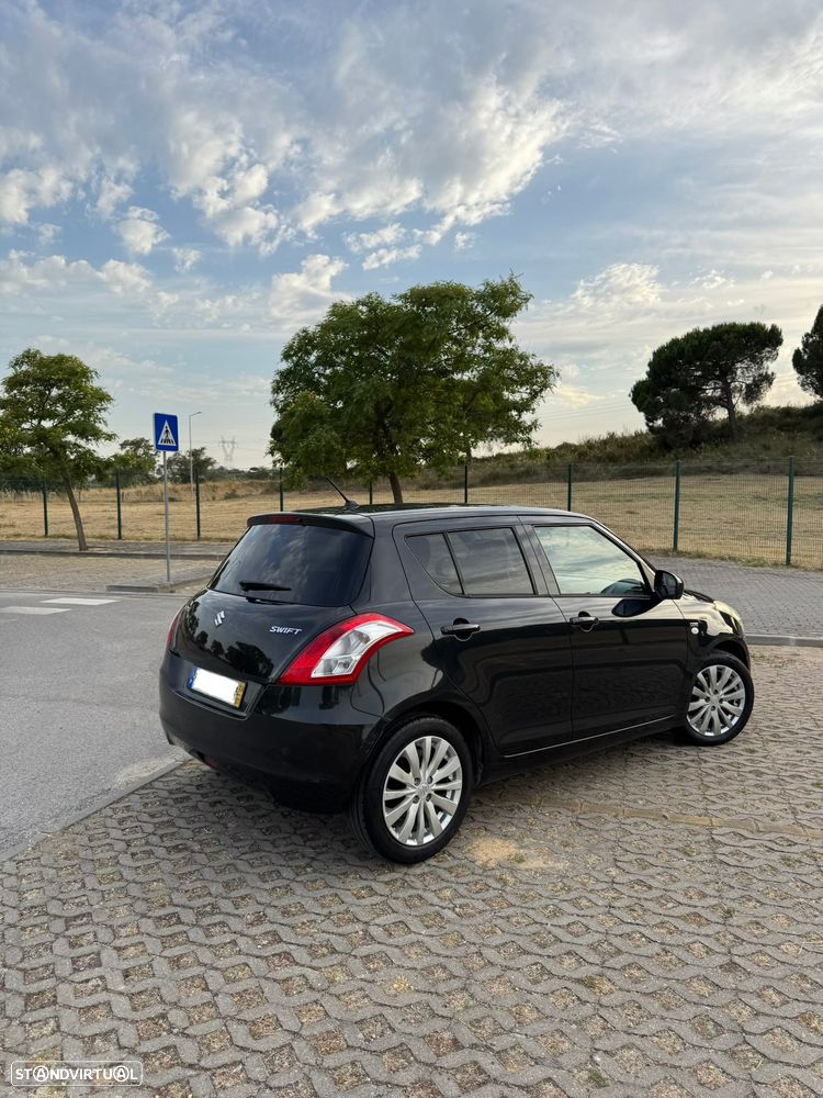 Suzuki Swift 1.3 DDiS GLX - 1