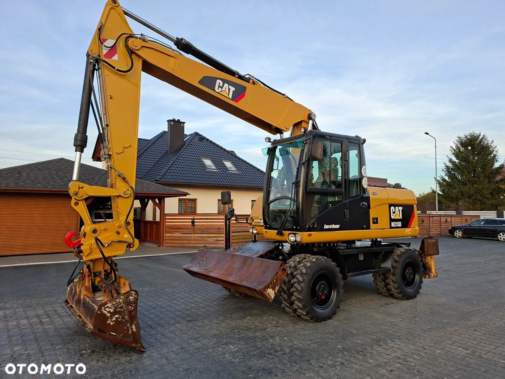 Caterpillar CAT M315D Rok 2011 - 5