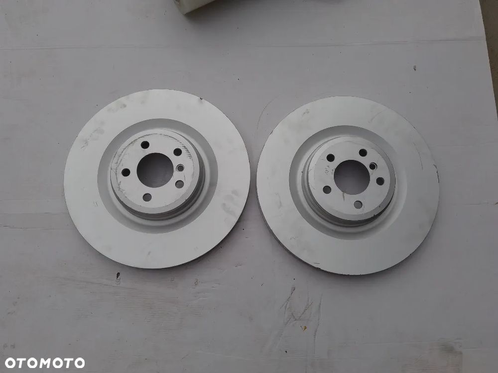 TARCZA HAMULCOWA TYŁ BMW F03 N63 N74 6775295 NOWA - 1