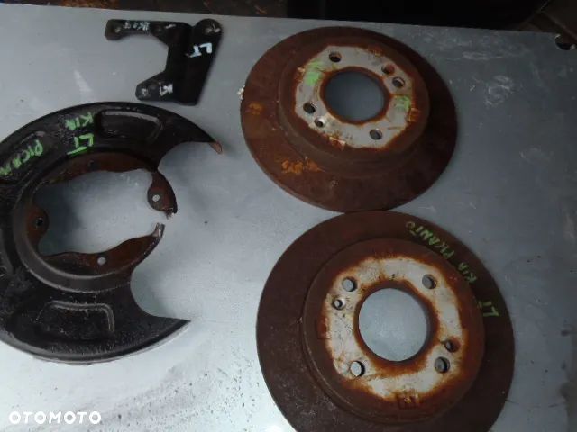 tarcza tarcze przewód hamulca hamulcowe klocki osłona blacha tarcza kotwiczna piasty kia picanto I - 1