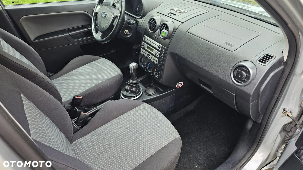 Ford Fusion 1.4 + - 13