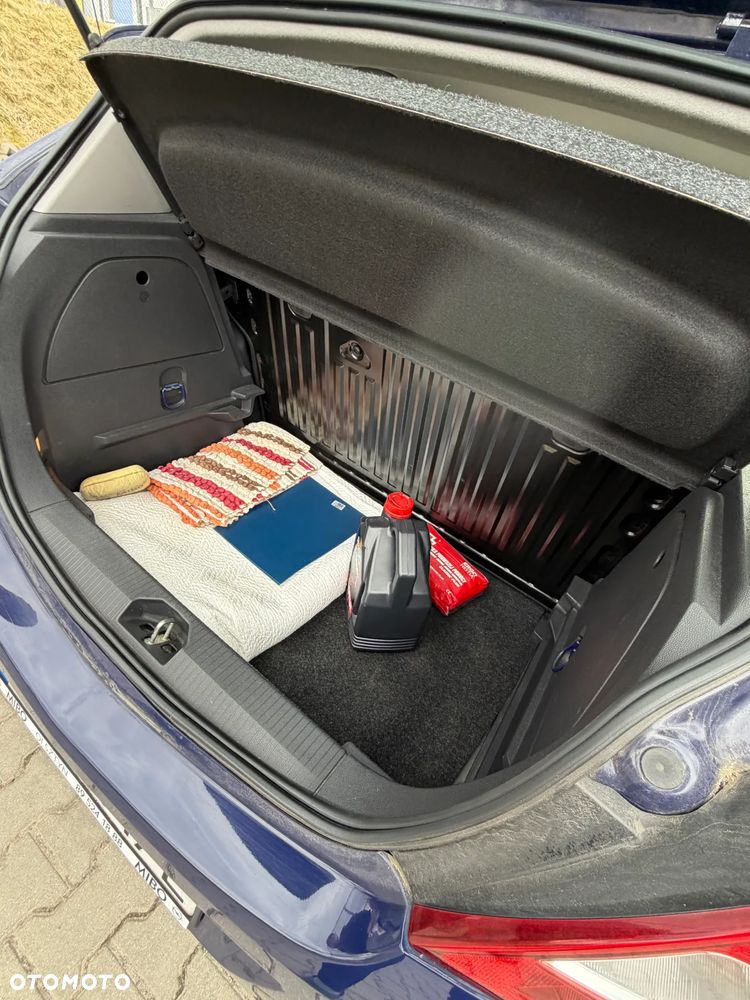 Opel Corsa 1.2 16V Enjoy - 21