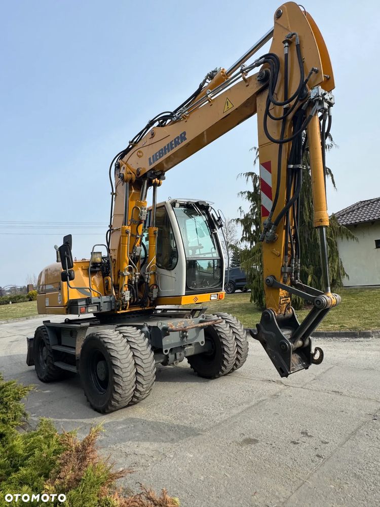 Liebherr 314 Litronic Rotator - 2