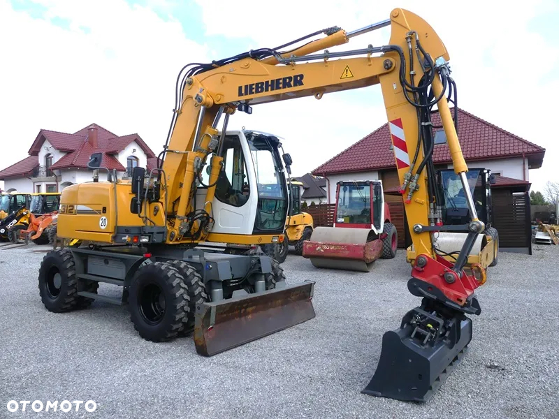 Liebherr A312 / Z Niemiec / 9126mtg / Super Stan / - 2