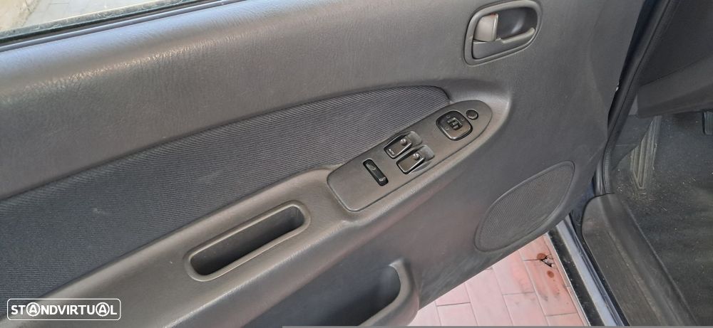 Mazda 323 - 4