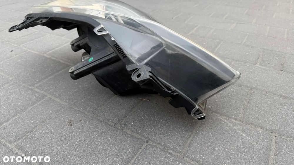 Lampa czarna Lewy PRZÓD OPEL ASTRA H HELLA III 2004-2014 przednia lewa reflektor Hella black - 8