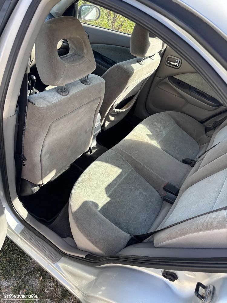 Nissan Almera 1.5 Comfort ABS+AC - 4
