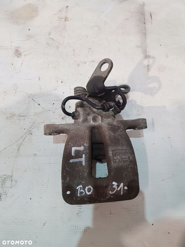 ZACISK HAMULCOWY LEWY TYŁ VW SKODA AUDI A3 8P EUR 08r 2.0 TFSI - 1