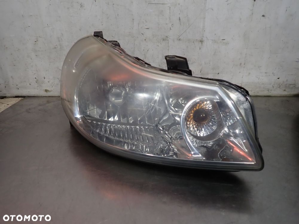 LAMPA PRAWA PRZEDNIA SUZUKI SX4 1.6 - 1