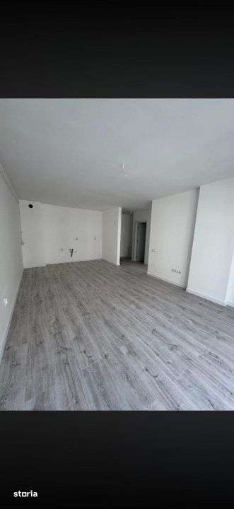 apartament semifinisat cu 2camere,etaj intermediar,parcare,zona Eroil — fotografia 1