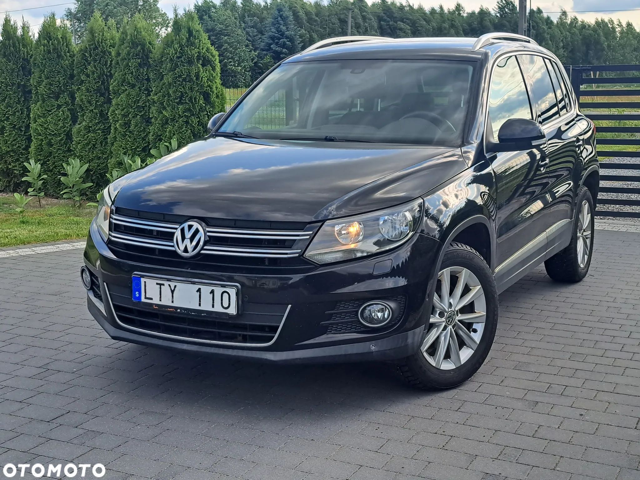 Volkswagen Tiguan 1.4 TSI 4Motion Exclusive - 1