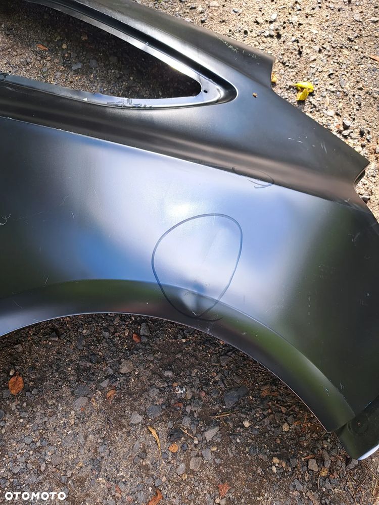 Błotnik lewy tył tylny Opel Astra J 4 IV GTC Lewe poszycie tylnego błotnika Opel Astra J GTC - 10