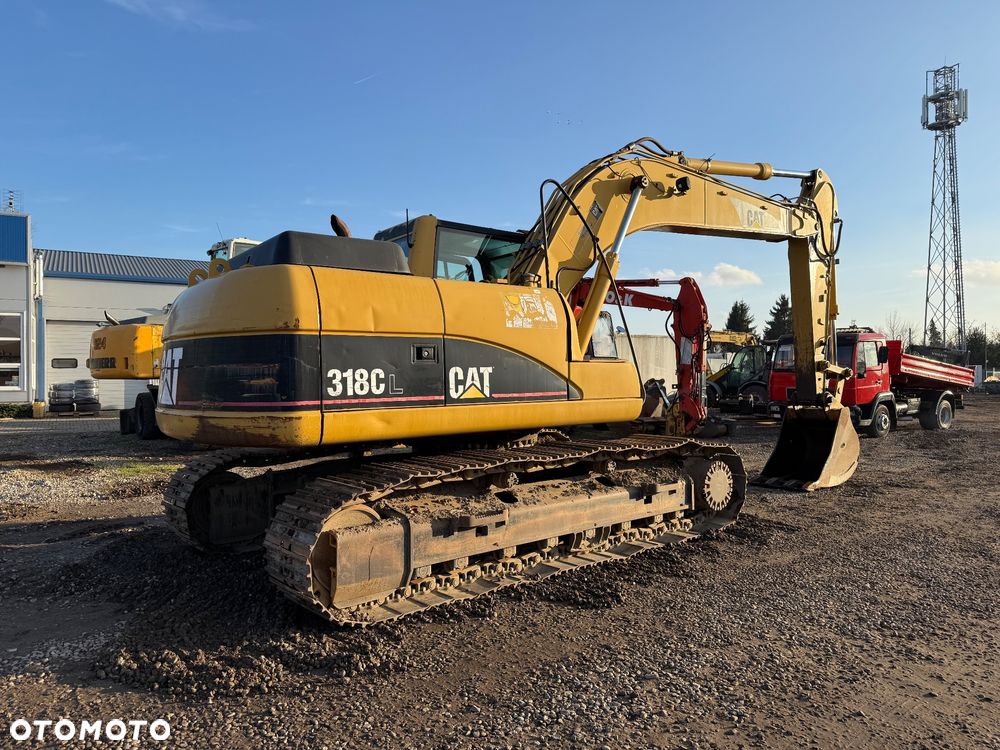 Caterpillar 318 CL - 12