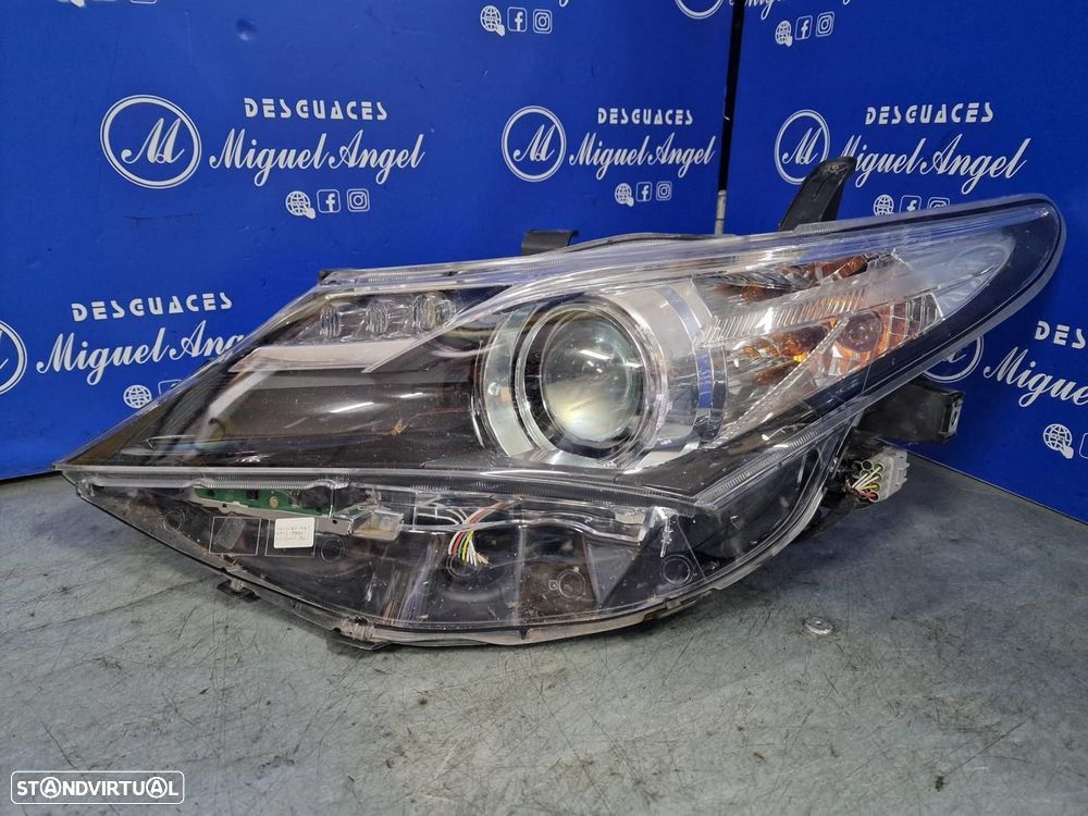 FAROL ESQUERDO TOYOTA AURIS TOURING SPORTS E18 - 1