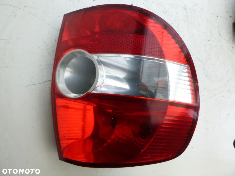 Volkswagen Fox 05-11 r. lampa lewy tył 5Z0945095A - 1