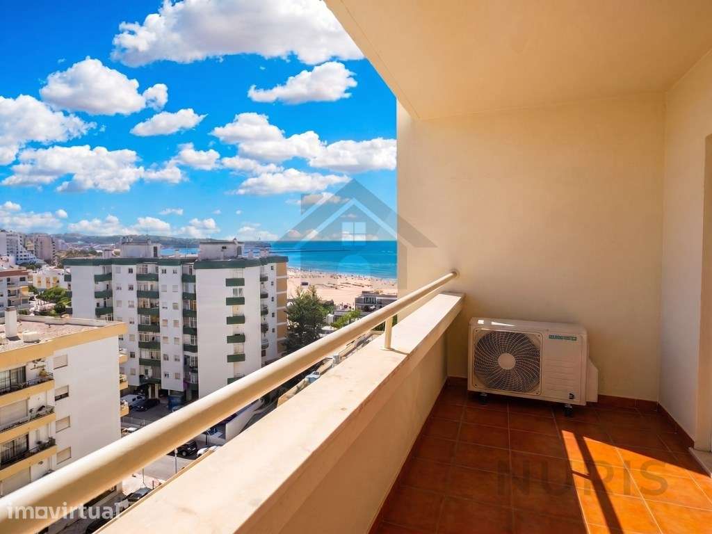 Apartamento T1 com Vista Mar para venda na Praia da Rocha - Grande imagem: 2/19