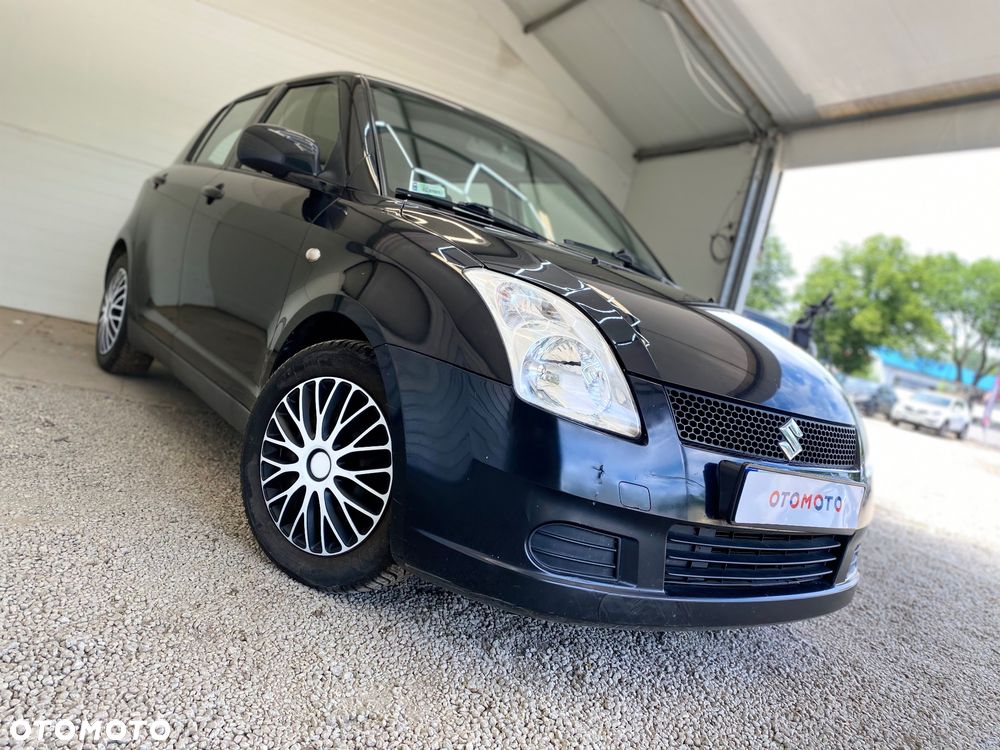 Suzuki Swift 1.3 Club - 33