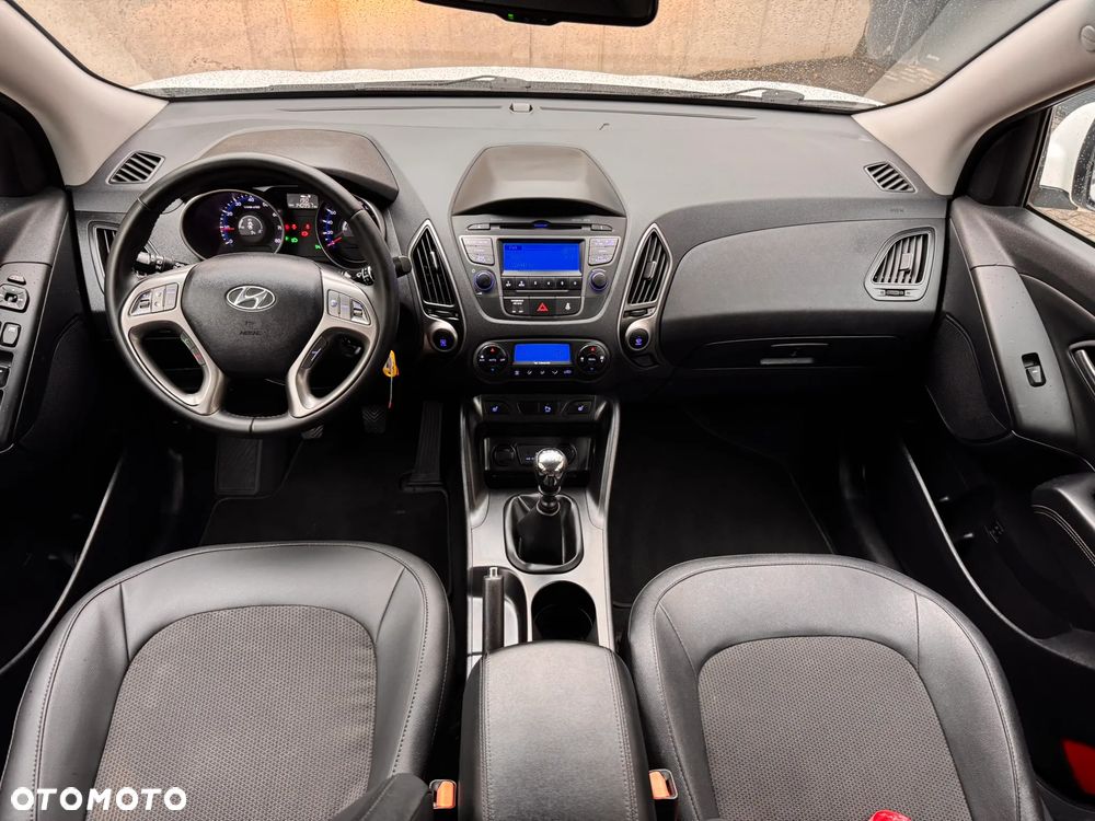 Hyundai ix35 blue 1.6 2WD Finale Gold - 11