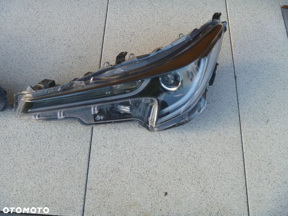 TOYOTA COROLLA E21 HB KOMBI GR ZDERZAK PRZEDNI ORYGINAŁ  4 PDC SPRYSKI - 9