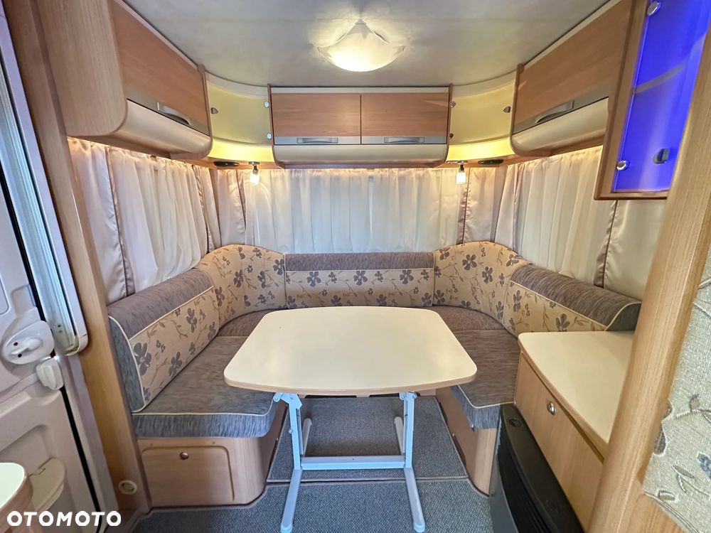 Adria ADORA 472 LU z napędem i markizą ze ścianami.  DMC 1300 - 12