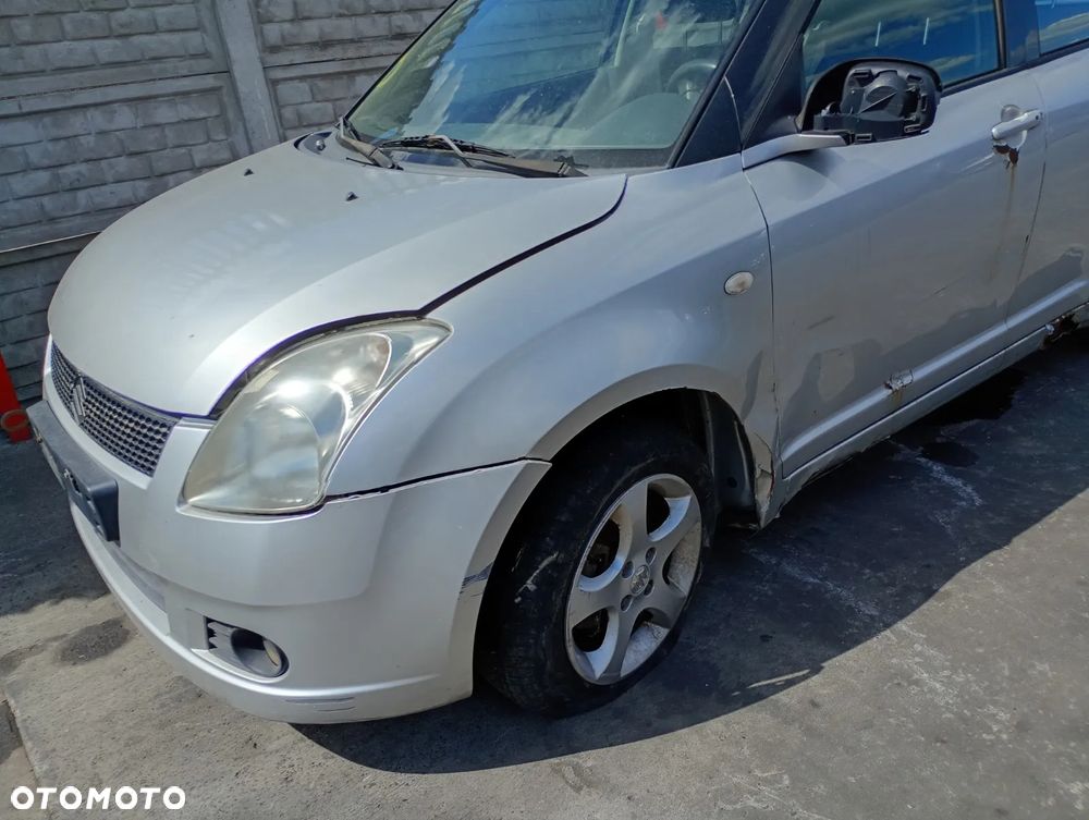 SUZUKI SWIFT 04-08 1.3 M13A - ZDERZAK TYL TYLNI Z2S - 2