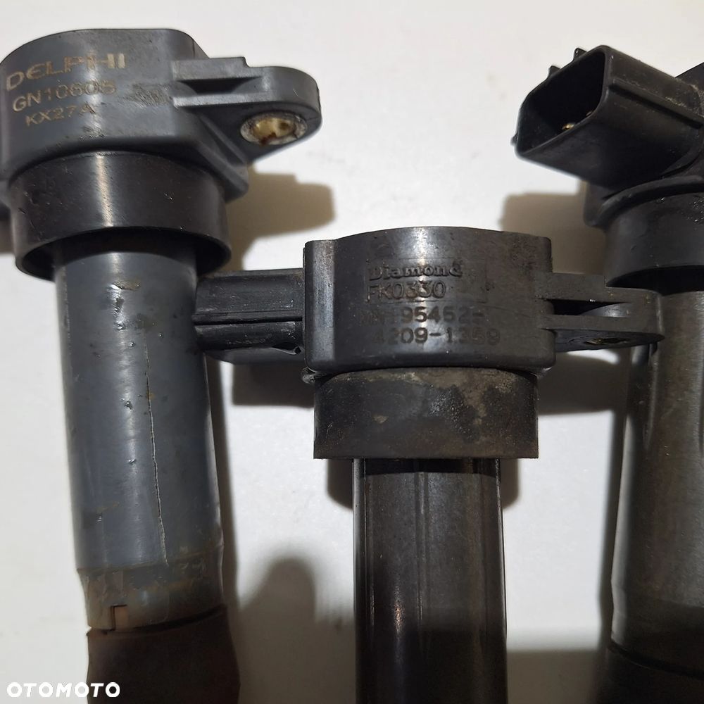 CEWKA ZAPLONOWA MITSUBISHI COLT SMART  1.3 MN195452 4209 1359 - 2