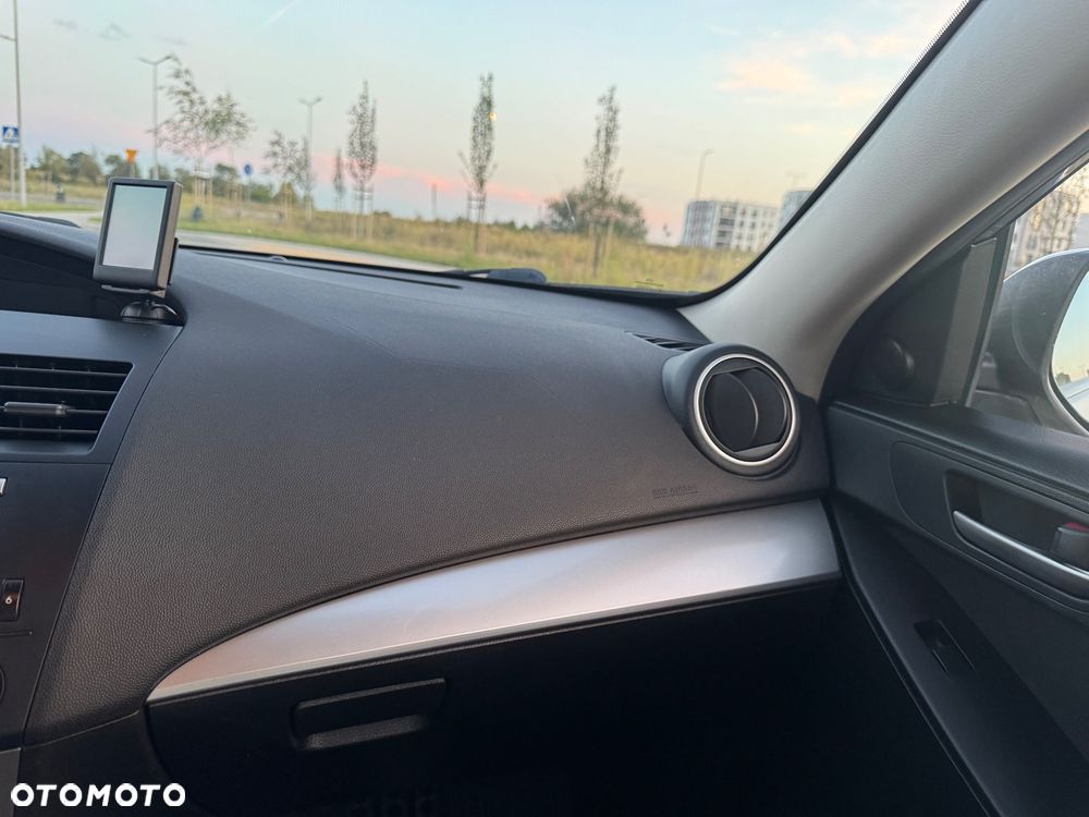 Mazda 3 2.0 Exclusive + - 12