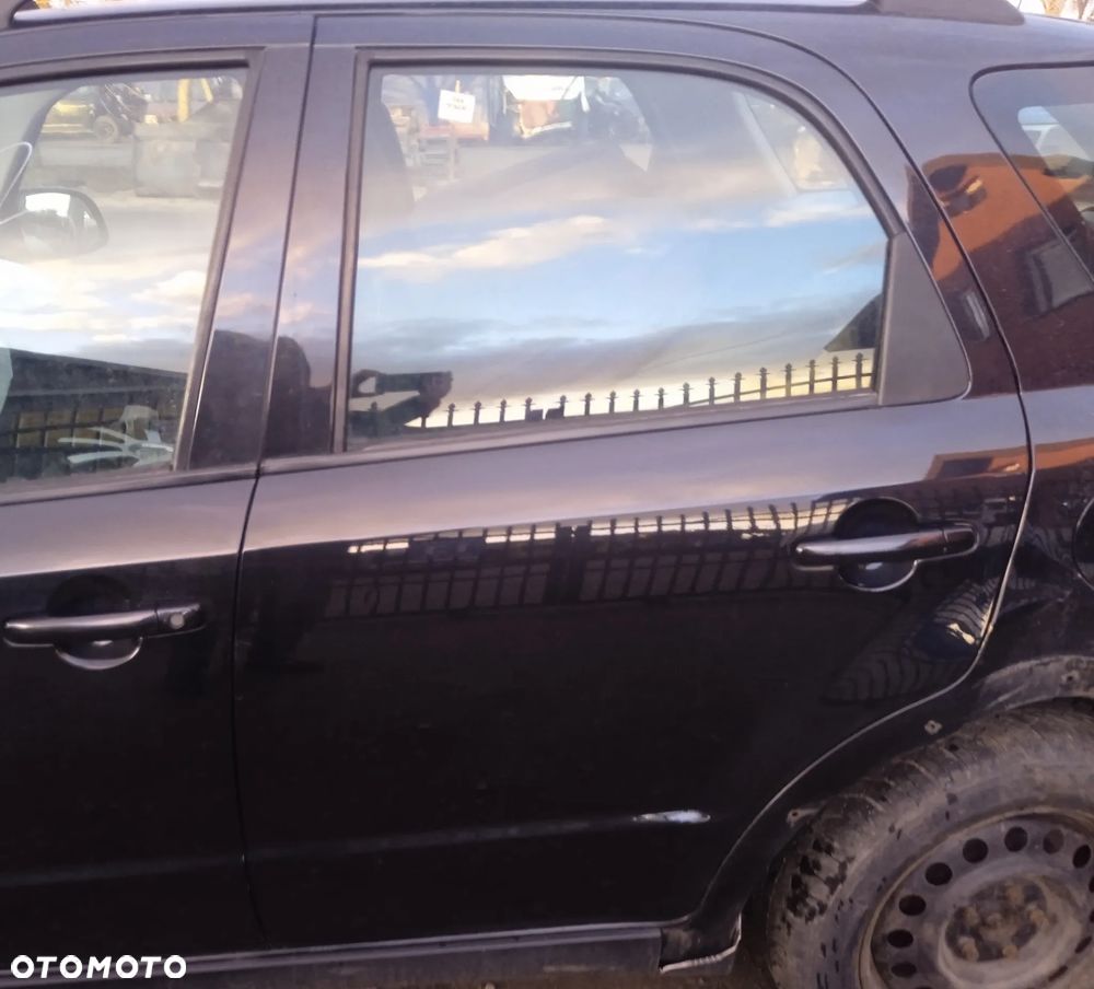 SUZUKI SX4 SEDICI drzwi lewe tylne lewy tył ZCE - 1