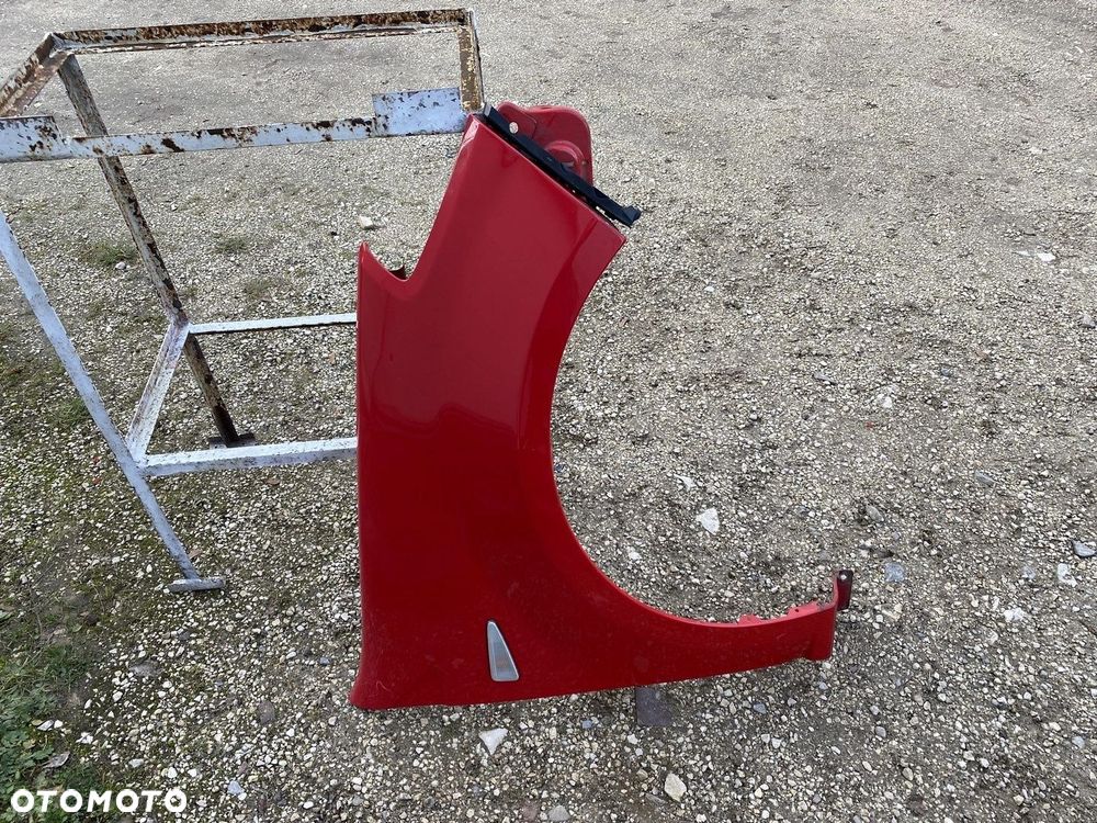 BŁOTNIK PRZEDNI PRAWY DACIA SANDERO I 08-12 LAKIER DV210 6001551025 - 2