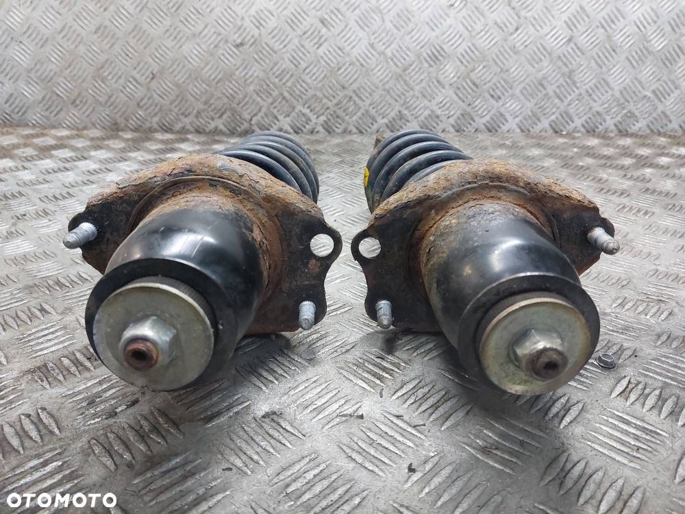 AMORTYZATOR + SPRĘŻYNA LEWY TYŁ + PRAWY TYŁ TOYOTA COROLLA VERSO I - 2