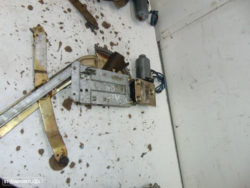 BMW E34 elevadores - 3