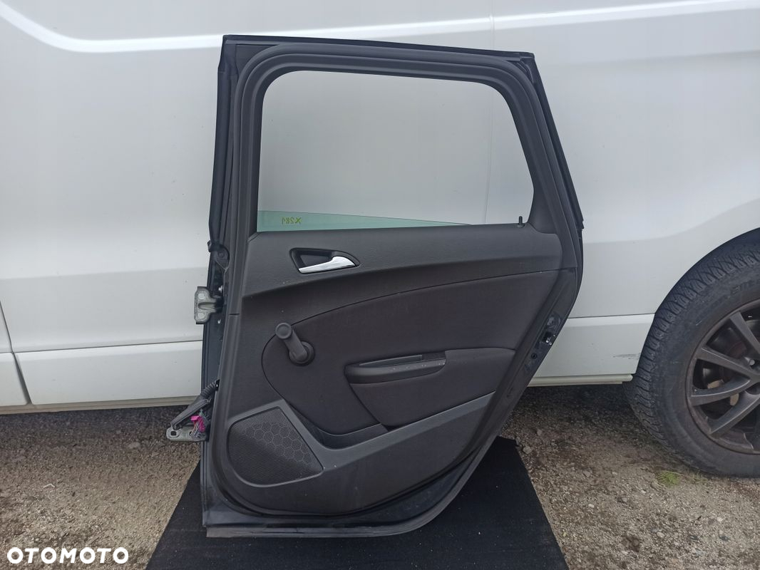 Drzwi prawy tył kompletne OPEL ASTRA IV J LIFT KOMBI Z22C 12-15 - 14