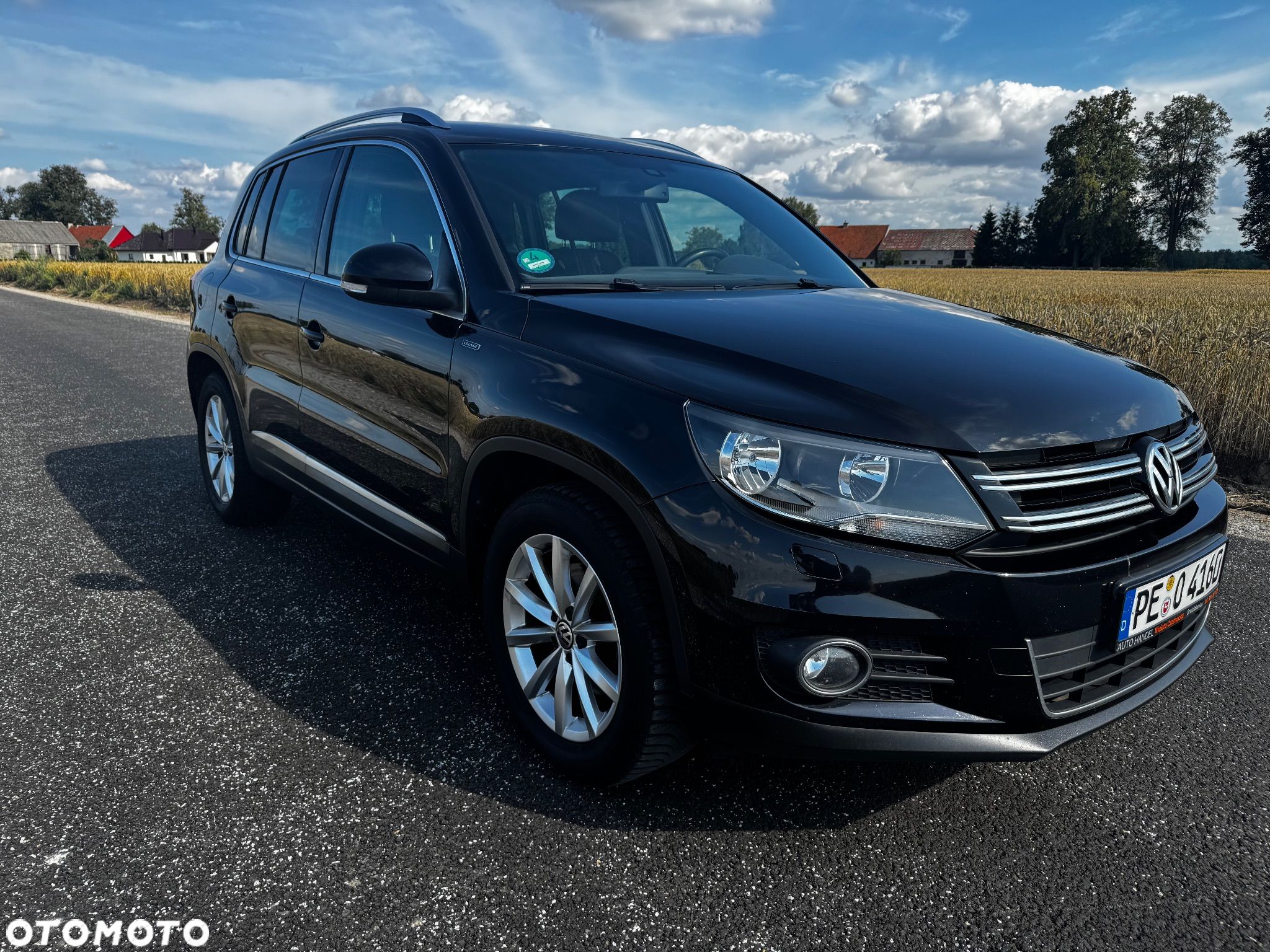 Volkswagen Tiguan 1.4 TSI BlueMotion Technology Lounge Sport & Style - 1